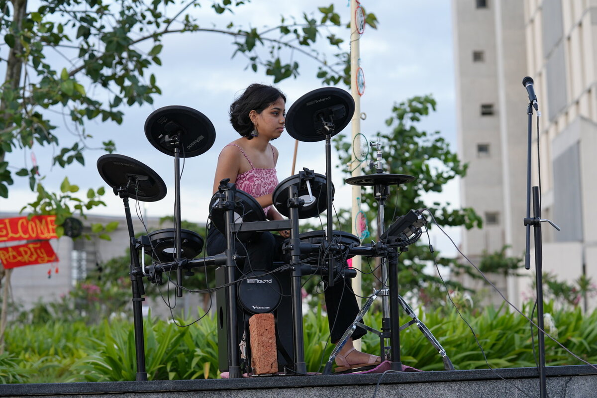 student playing drum in Bangalore campus