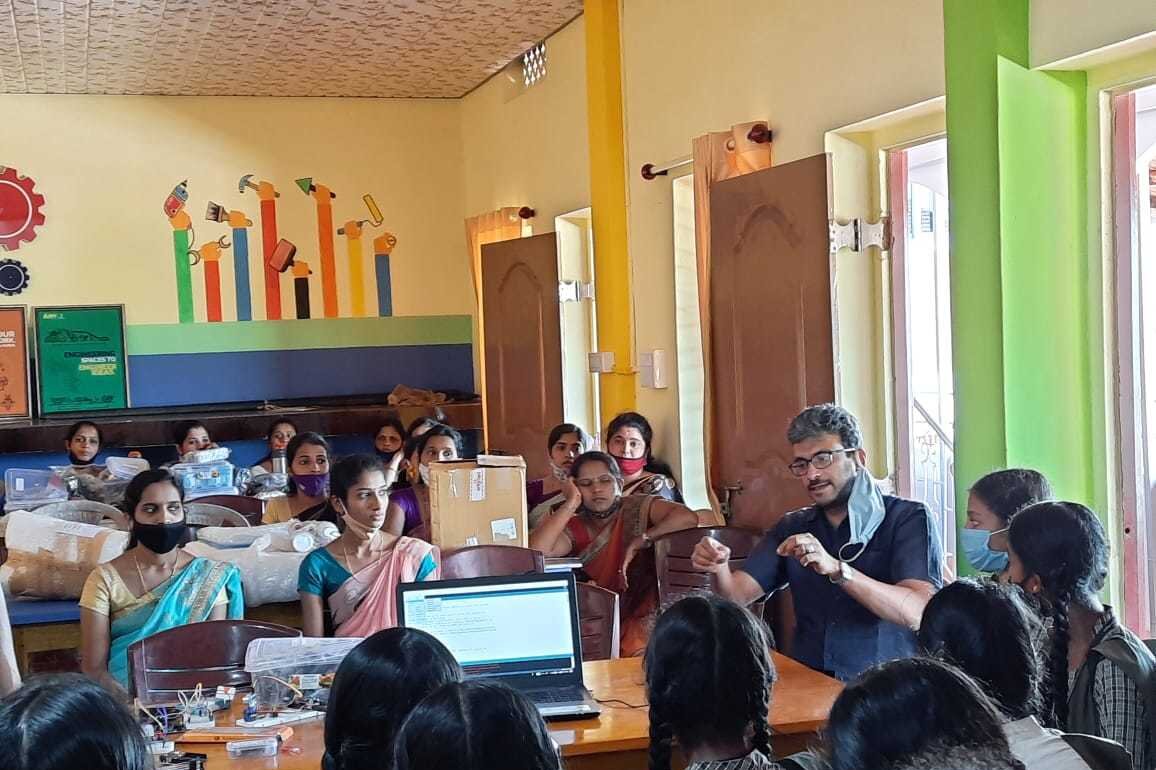 school classroom with students and teachers