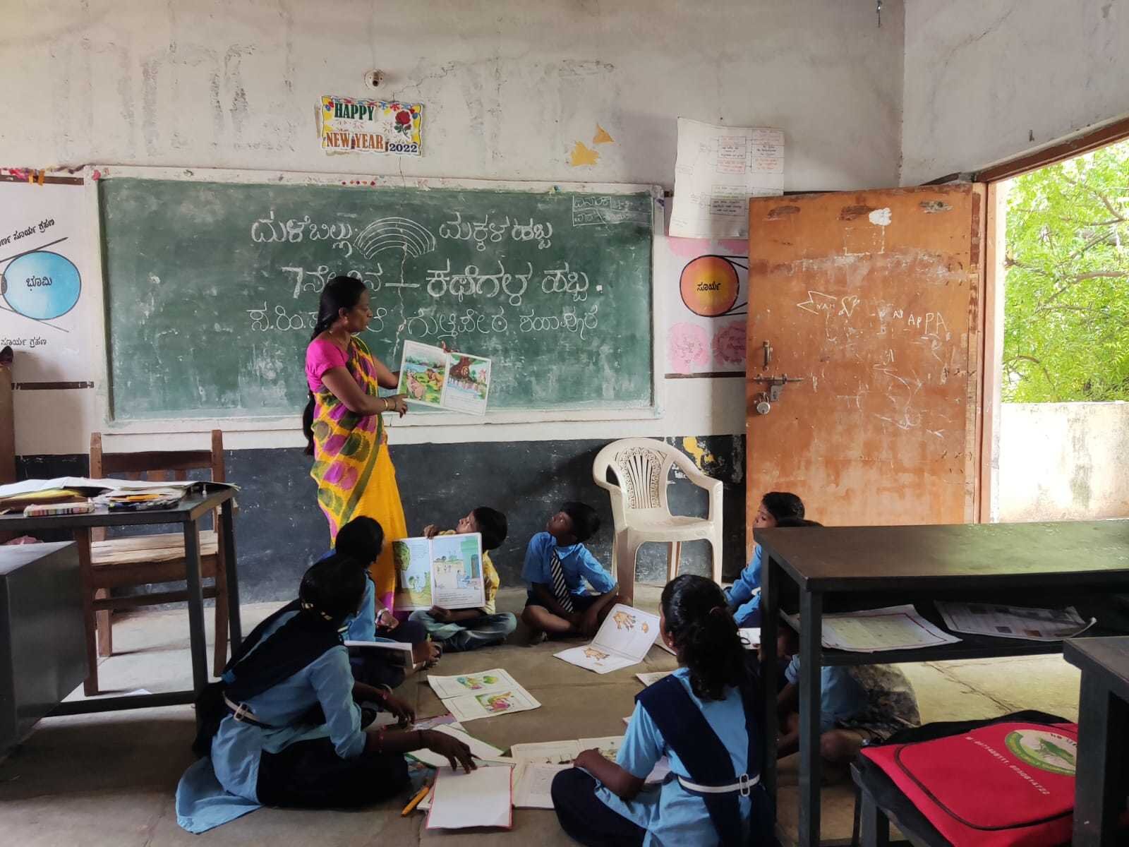 Teacher teaching in classroom through image