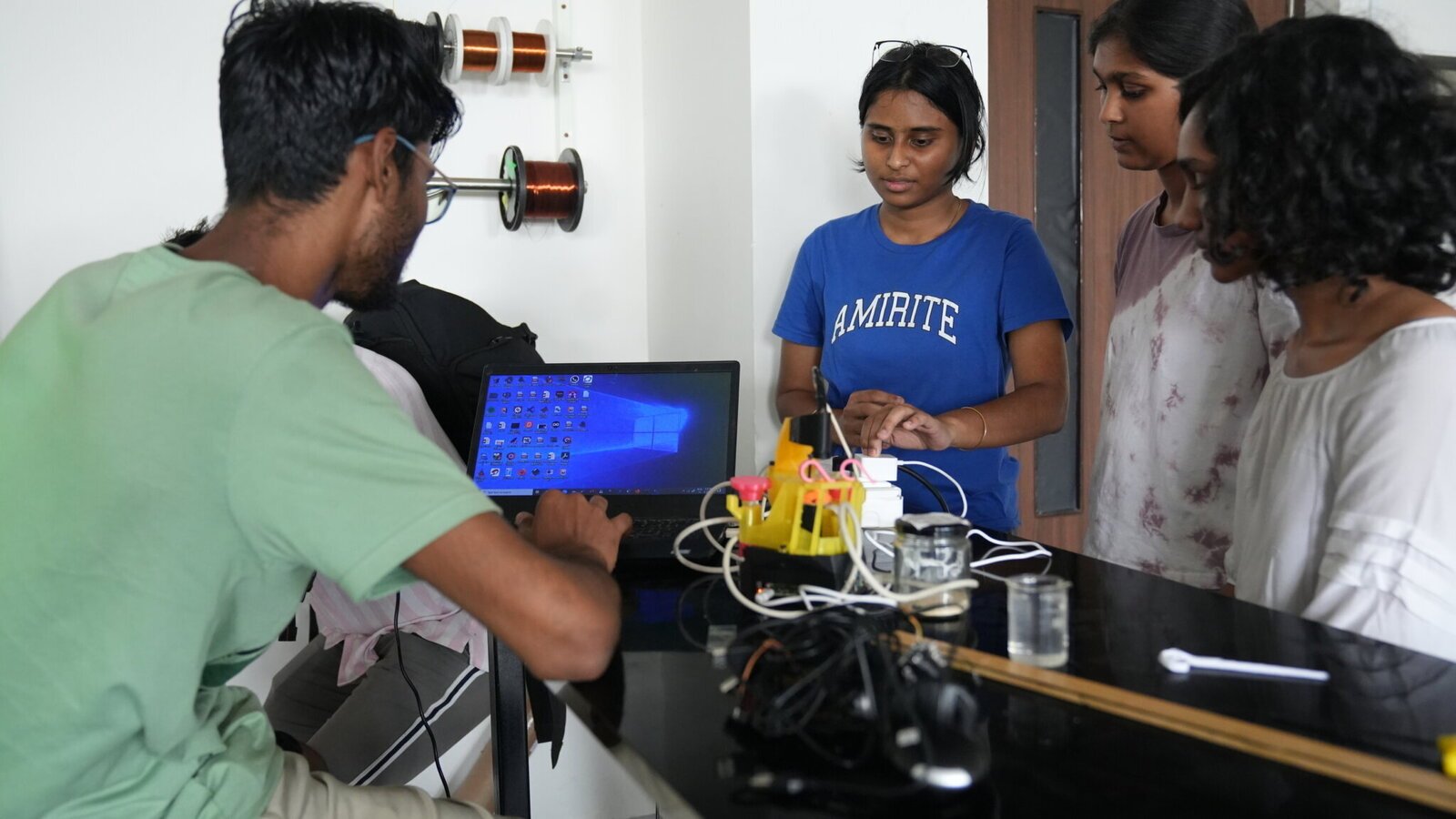 students in physics lab