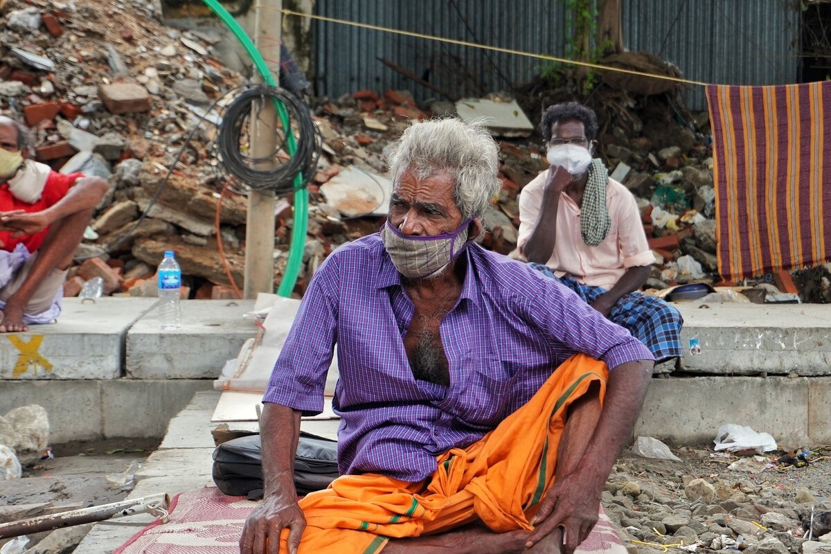 Kerala Poverty and Old age persons with mask