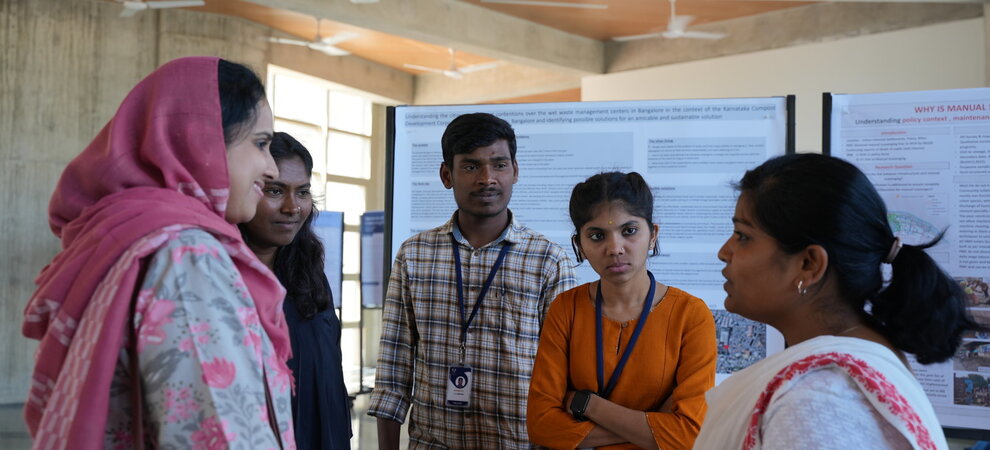 Students discussion in poster presentation