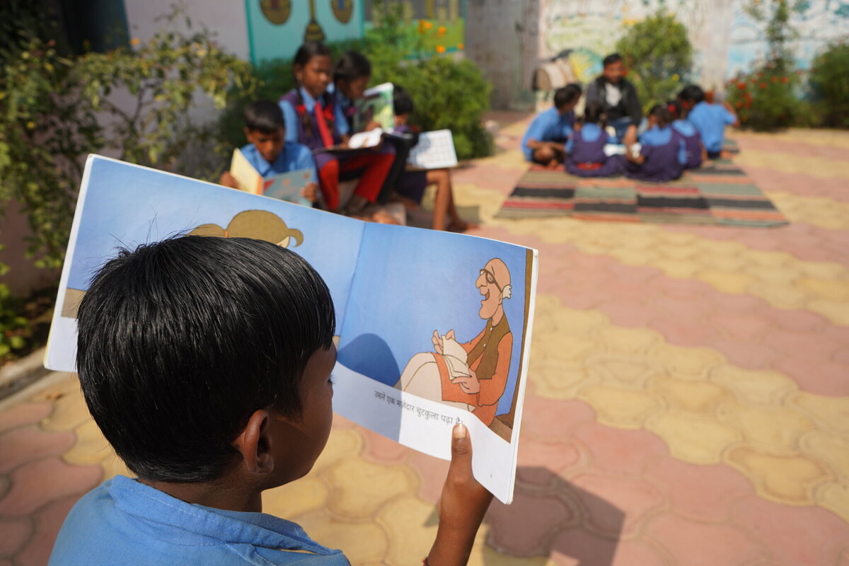 Child reading storybook