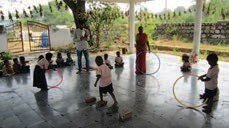 Nature walks as a pedagogical tool pic2 children playing with hoop